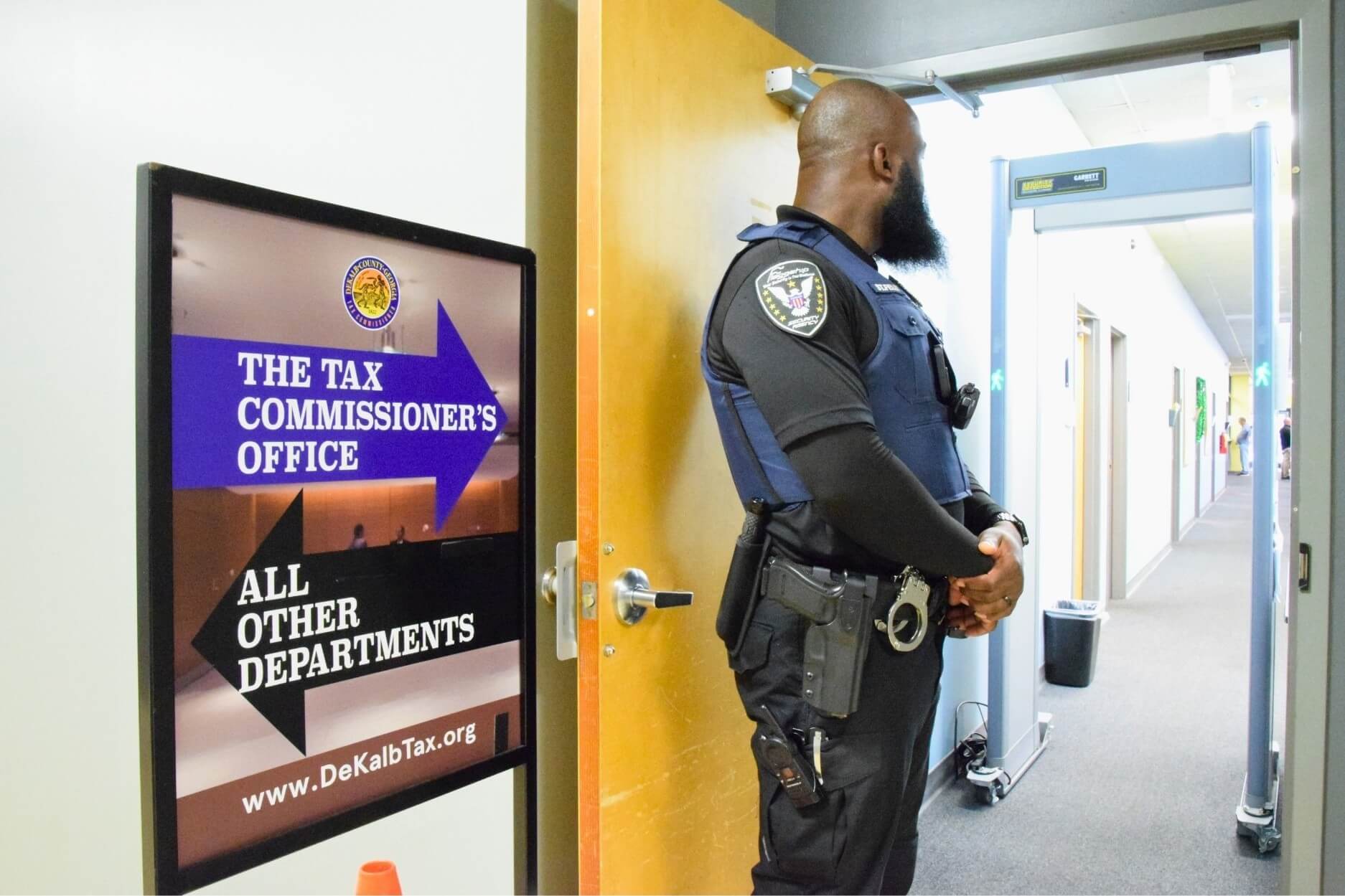 Police officer standing in doorway