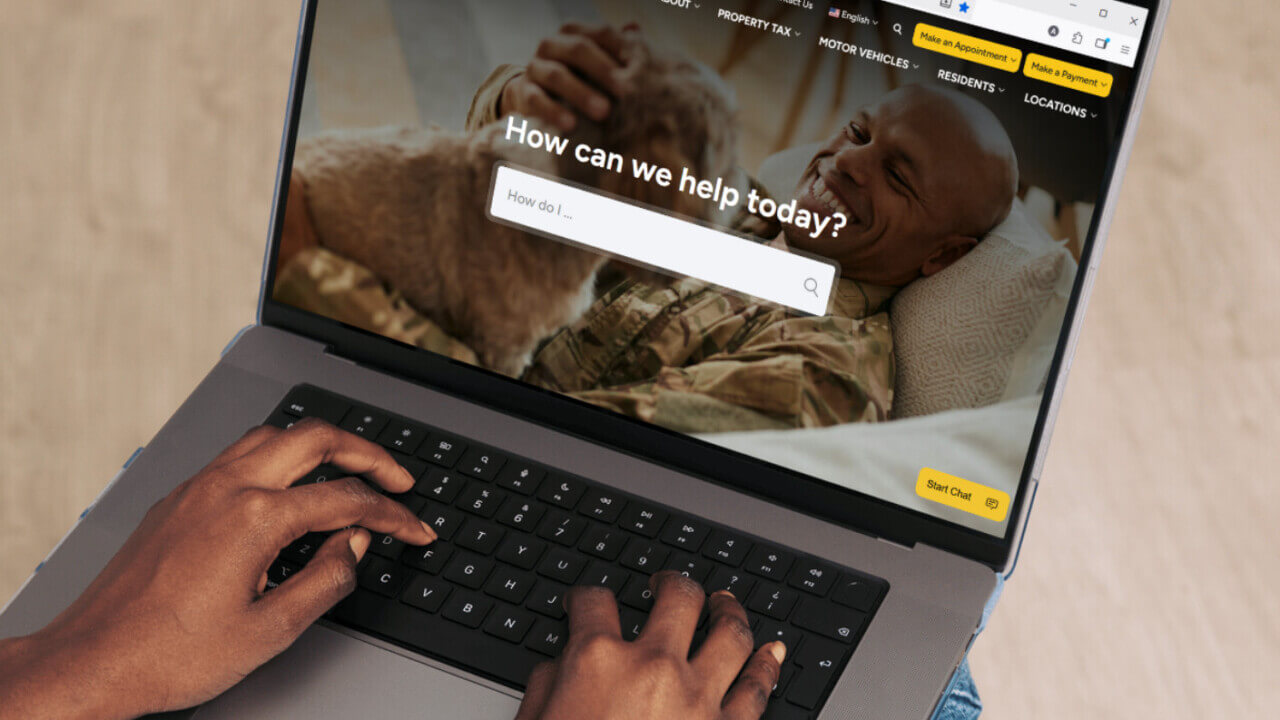 military service member with dog (cropped)